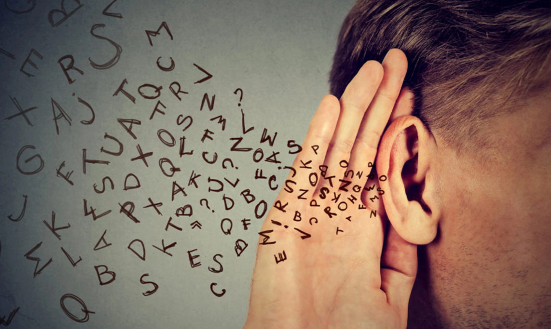 graphic showing a person cupping their hand behind their ear with lots of written letters streaming into the ear.
