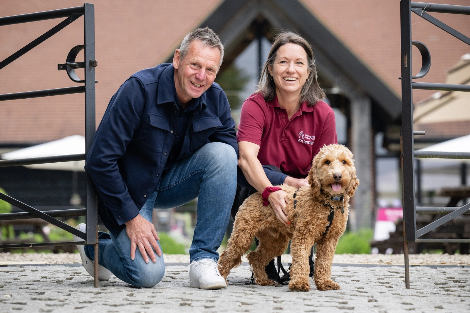 Stuart Pearce hearing links trainer and puppy